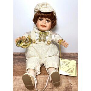Porcelain Collectors Wind Up Doll  Certificate Of Authenticity Plays music Moves